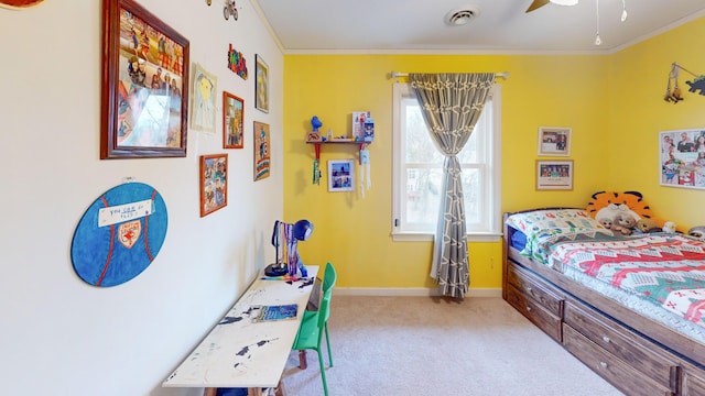 bedroom with ceiling fan, carpet flooring, visible vents, baseboards, and ornamental molding