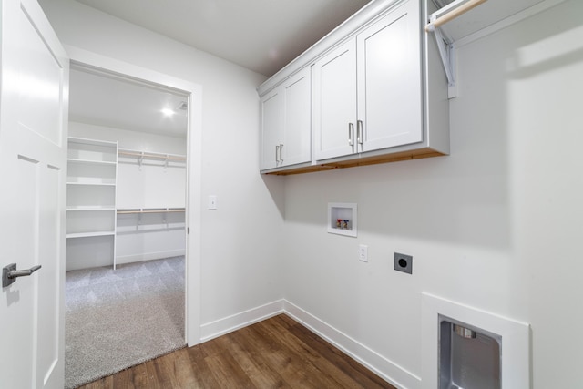 laundry area featuring washer hookup, cabinet space, dark carpet, electric dryer hookup, and baseboards