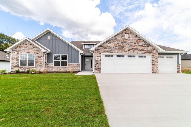 craftsman house with a garage, driveway, a front lawn, and board and batten siding