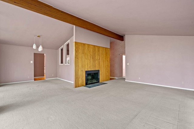 unfurnished living room with vaulted ceiling with beams, a fireplace, carpet flooring, and baseboards