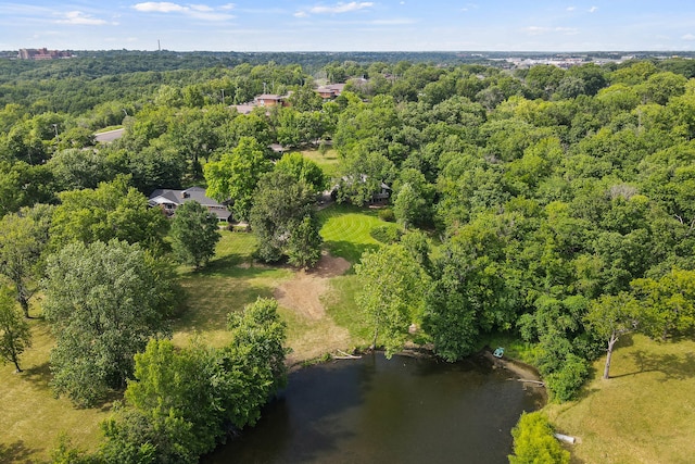 bird's eye view featuring a wooded view