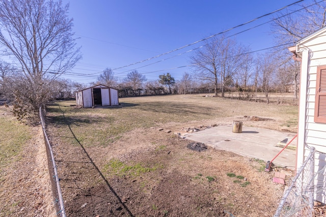 view of yard with an outbuilding and a storage unit