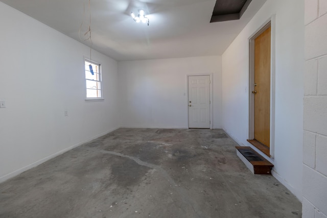 garage featuring baseboards