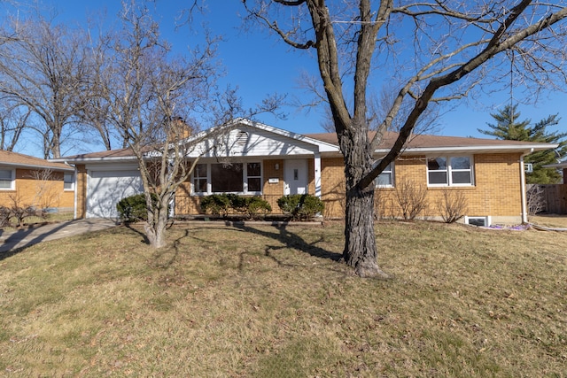 single story home featuring brick siding, a front lawn, a chimney, driveway, and an attached garage