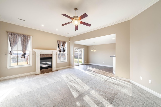 unfurnished living room featuring baseboards, light carpet, ornamental molding, and a fireplace