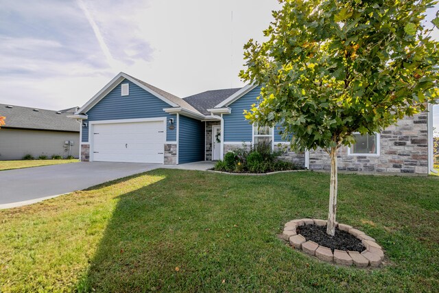 single story home featuring stone siding, an attached garage, driveway, and a front yard