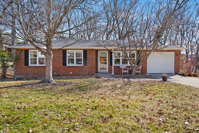 ranch-style house featuring a garage, a front lawn, concrete driveway, and brick siding