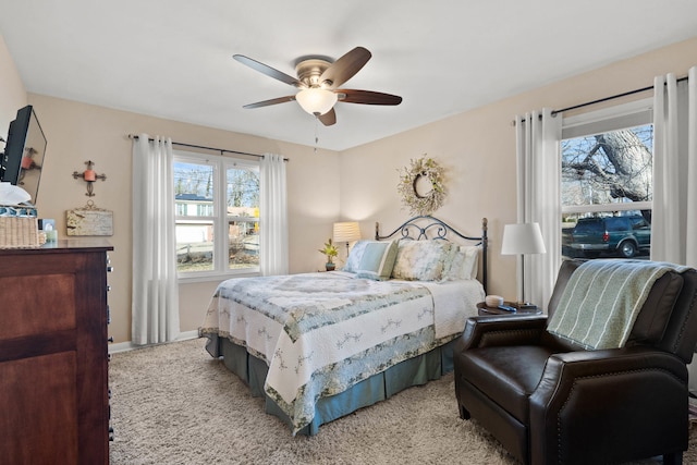 bedroom with carpet flooring and a ceiling fan