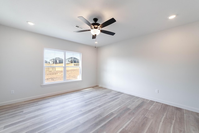 empty room with visible vents, baseboards, recessed lighting, ceiling fan, and light wood-style floors