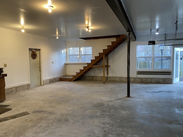 basement featuring stairs