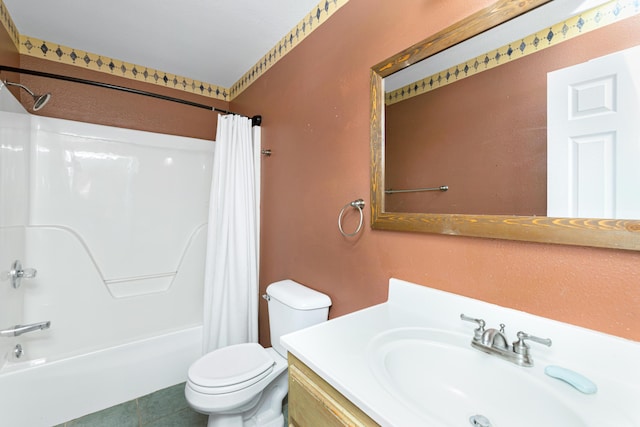 full bathroom with vanity, toilet, and shower / tub combo