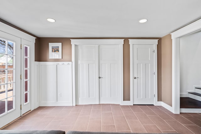 unfurnished bedroom with recessed lighting and baseboards