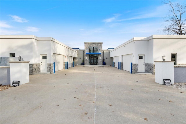 40 US Pl Unit 2B, Sunrise Beach, MO 65079 - exterior space featuring an attached garage
