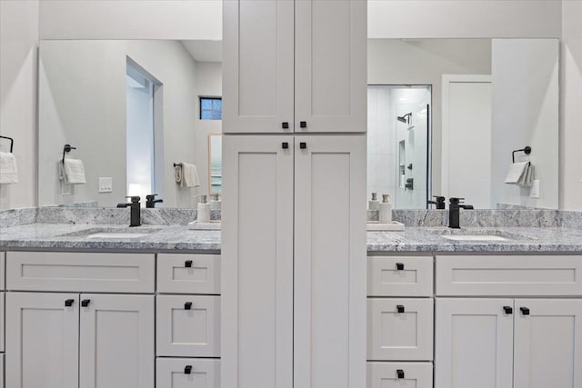 40 US Pl Unit 2B, Sunrise Beach, MO 65079 - bathroom with a sink, two vanities, and a stall shower