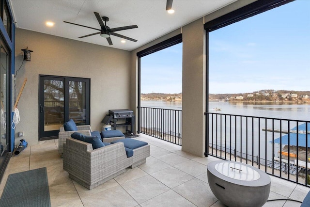40 US Pl Unit 2B, Sunrise Beach, MO 65079 - exterior space with a ceiling fan and a water view