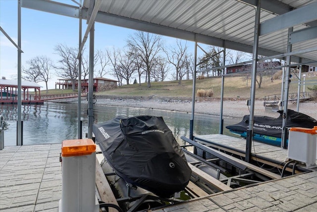 40 US Pl Unit 2B, Sunrise Beach, MO 65079 - view of dock featuring a water view and boat lift