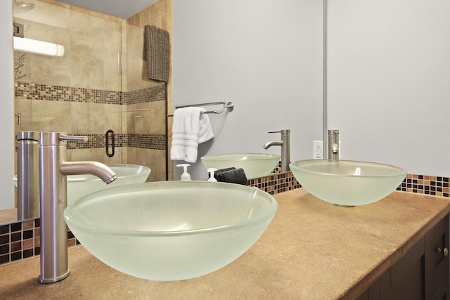 bathroom with vanity, a shower stall, and radiator heating unit