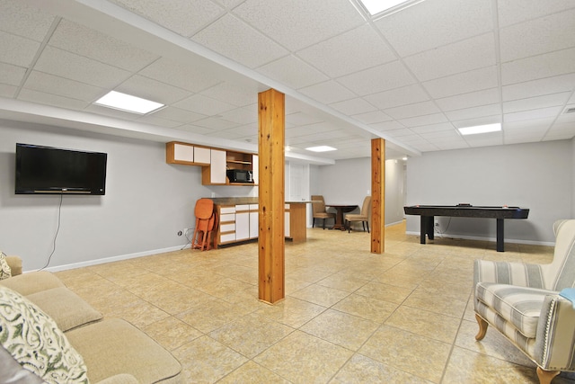 recreation room featuring pool table, light tile patterned flooring, baseboards, and a drop ceiling