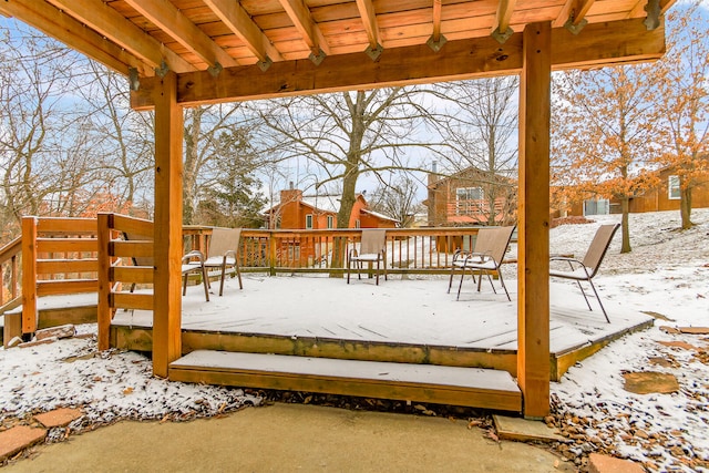 view of snow covered deck