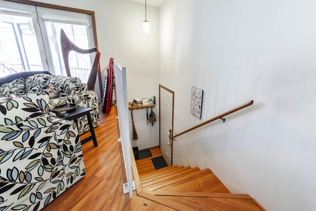 stairs with wood finished floors