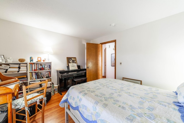 bedroom with light wood-style flooring