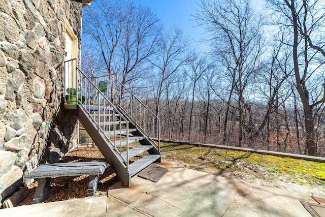 view of patio / terrace featuring stairway