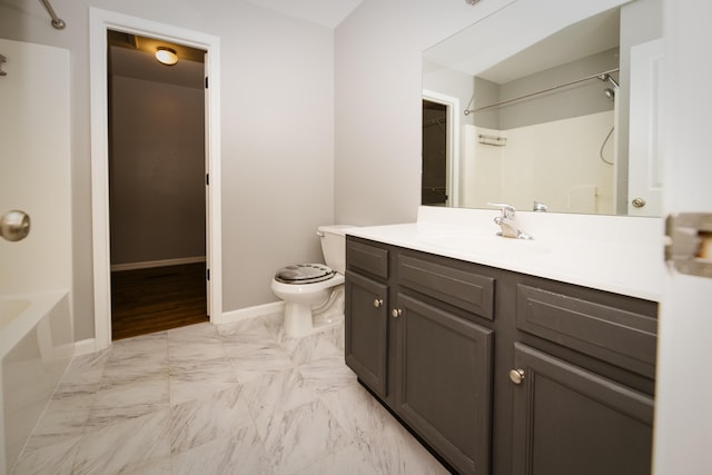 full bathroom featuring vanity, baseboards, bathtub / shower combination, toilet, and marble finish floor