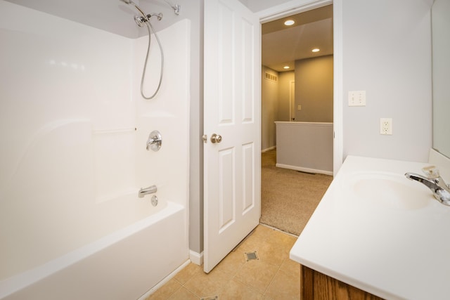 bathroom with recessed lighting, shower / bathing tub combination, vanity, and tile patterned flooring