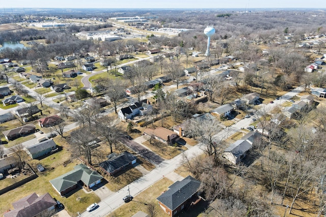 birds eye view of property with a residential view