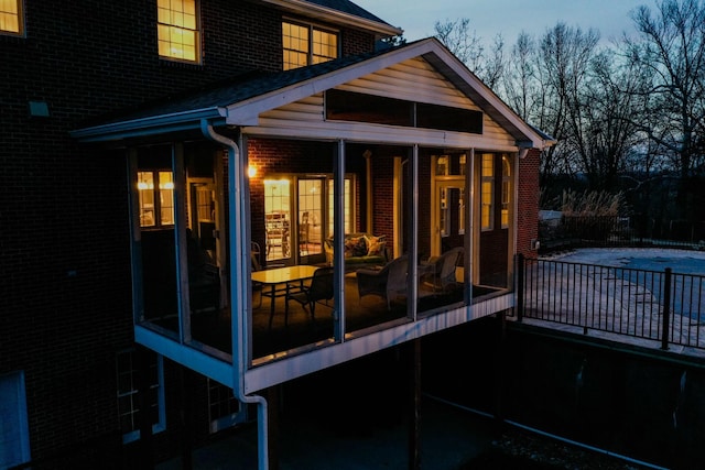 exterior space with a sunroom