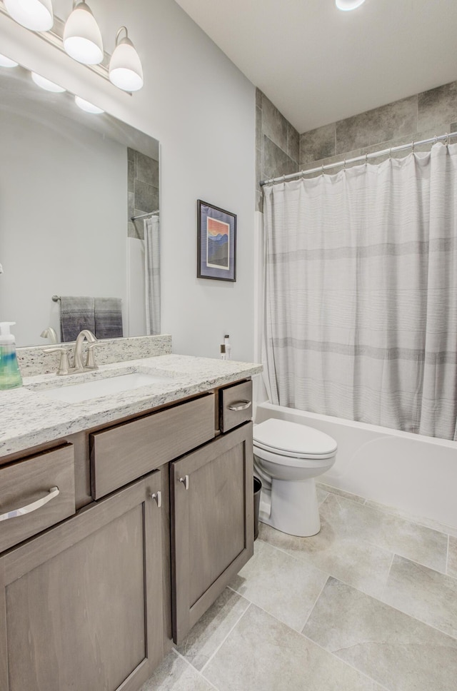 bathroom featuring toilet, vanity, and shower / tub combo with curtain