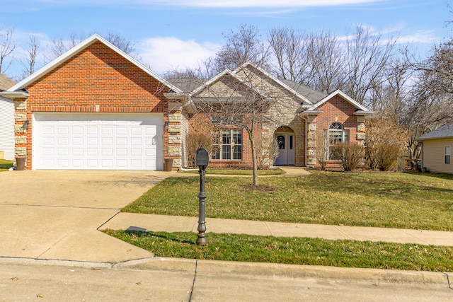 view of front facade with brick siding, an attached garage, concrete driveway, and a front yard