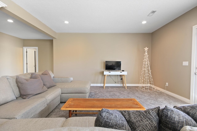 living area with recessed lighting, visible vents, baseboards, and carpet