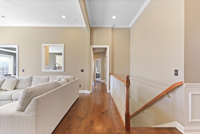 living room featuring recessed lighting, baseboards, ornamental molding, and dark wood finished floors