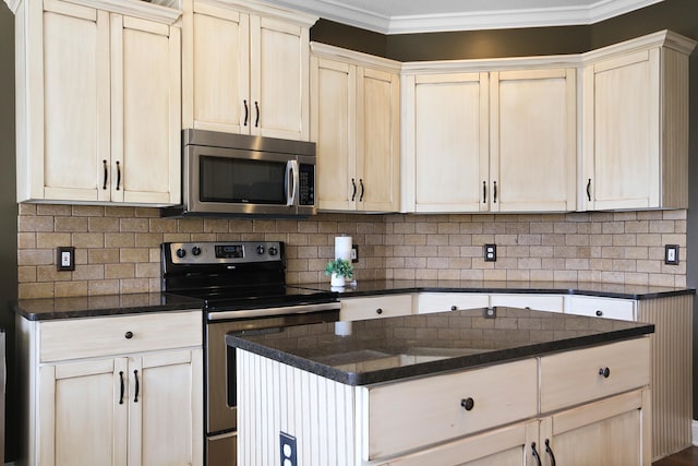 kitchen featuring decorative backsplash, dark stone countertops, appliances with stainless steel finishes, and ornamental molding