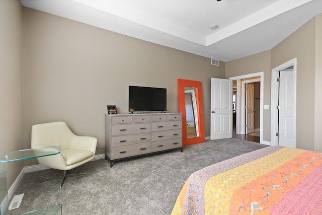 bedroom with carpet flooring, baseboards, and visible vents