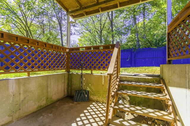 view of patio / terrace featuring fence