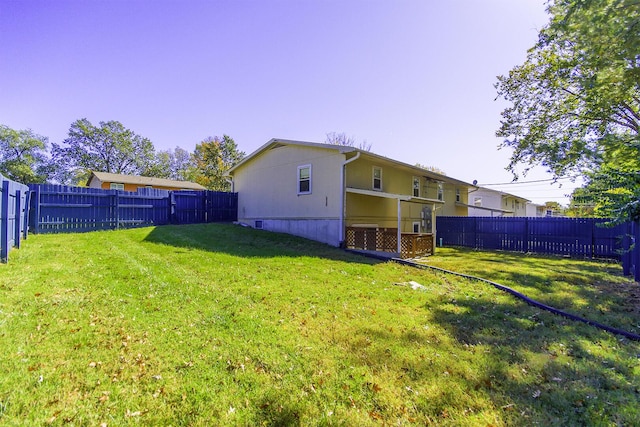 view of yard featuring a fenced backyard