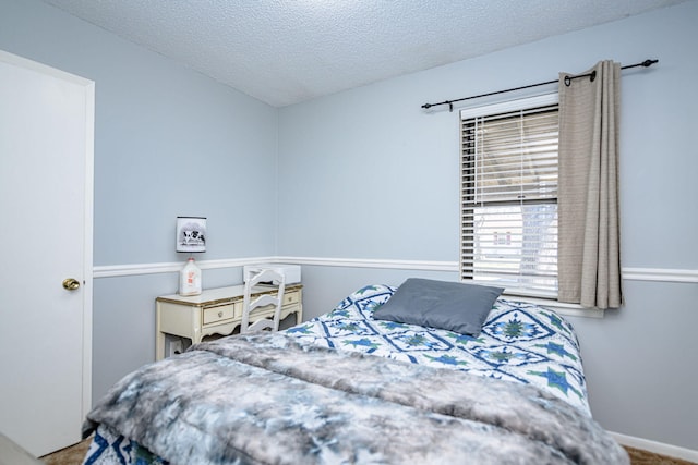 bedroom with a textured ceiling