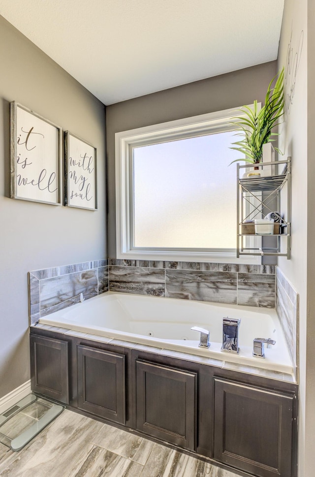 full bathroom with a garden tub