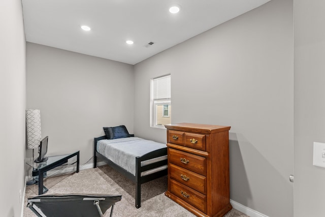 bedroom featuring light carpet, visible vents, recessed lighting, and baseboards