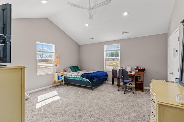 bedroom featuring visible vents, light carpet, a ceiling fan, baseboards, and vaulted ceiling