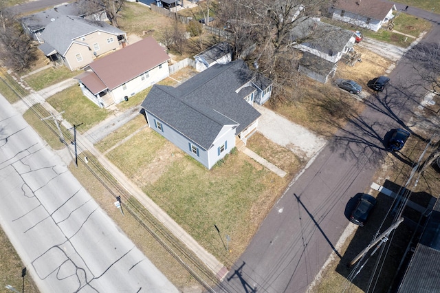 birds eye view of property with a residential view