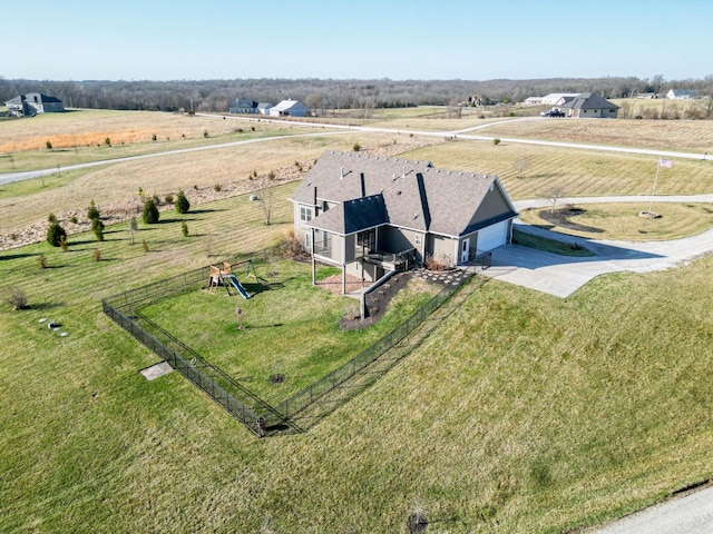 birds eye view of property featuring a rural view