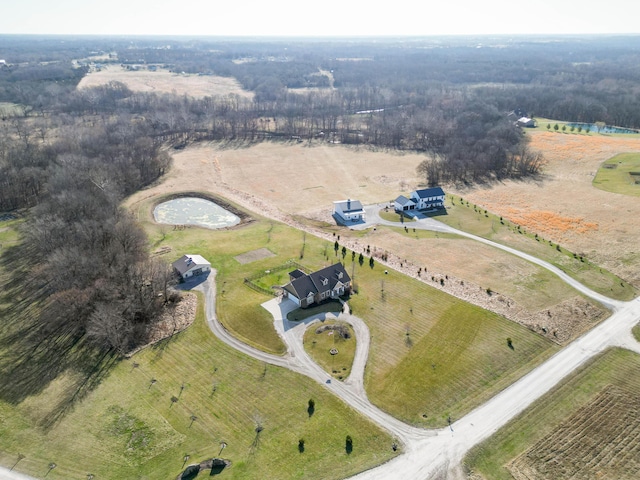 birds eye view of property featuring a rural view