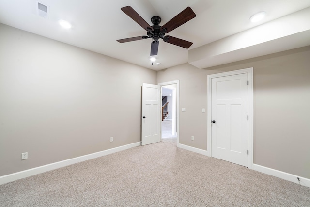 unfurnished bedroom featuring a ceiling fan, visible vents, baseboards, carpet floors, and recessed lighting