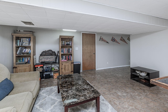 living room with visible vents and baseboards