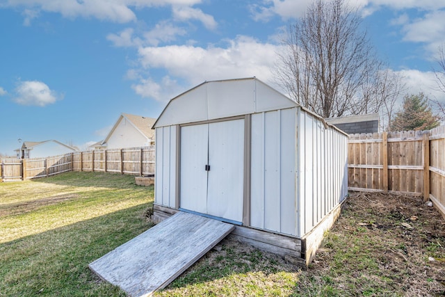 view of shed featuring a fenced backyard