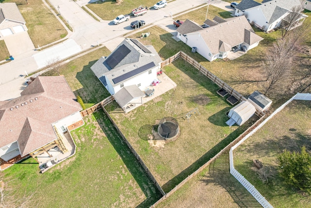 birds eye view of property with a residential view