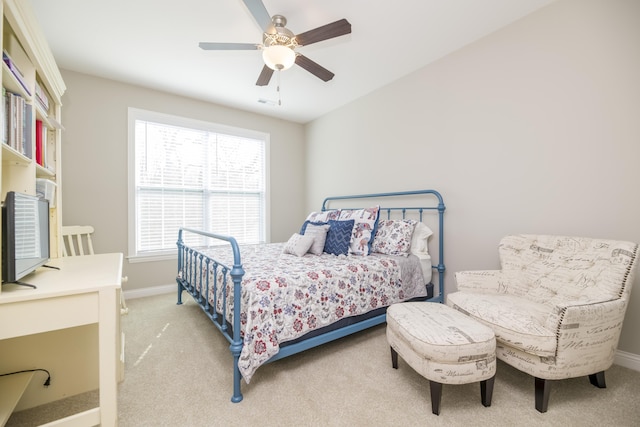 bedroom with baseboards, carpet floors, and ceiling fan